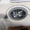 Фото стиральной машины в процессе ремонта